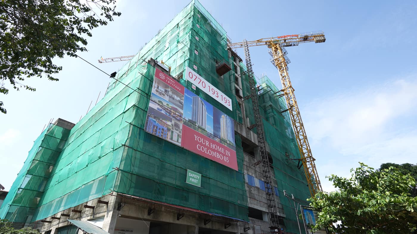 Street-level view with the tower crane, Fairway Latitude, August 2026