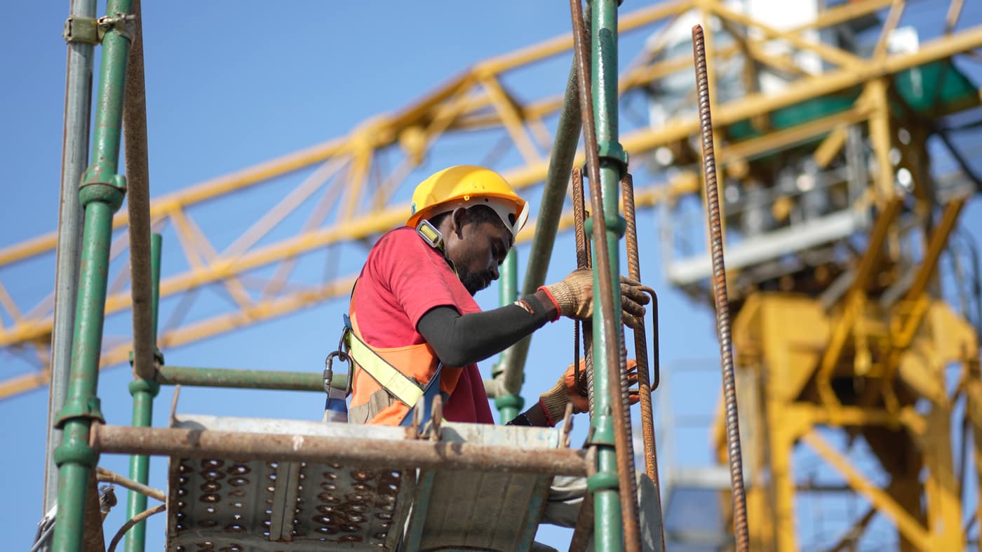 Crew at work on the scaffold, Fairway Latitude, July 2026