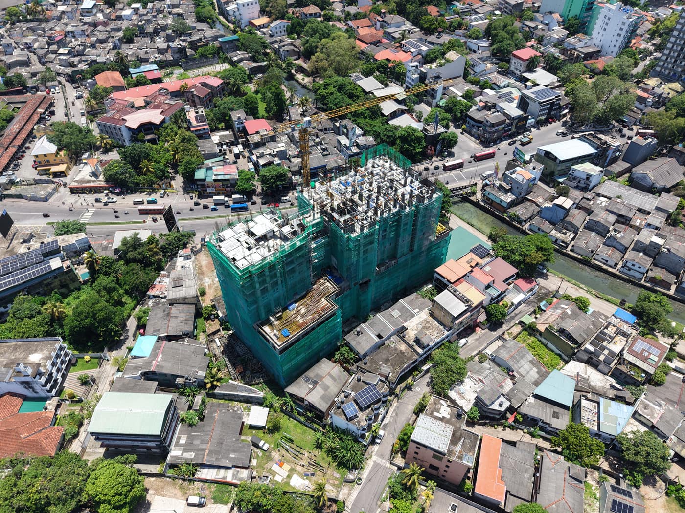 High aerial view of the tower beside the canal, Fairway Latitude, September 2026